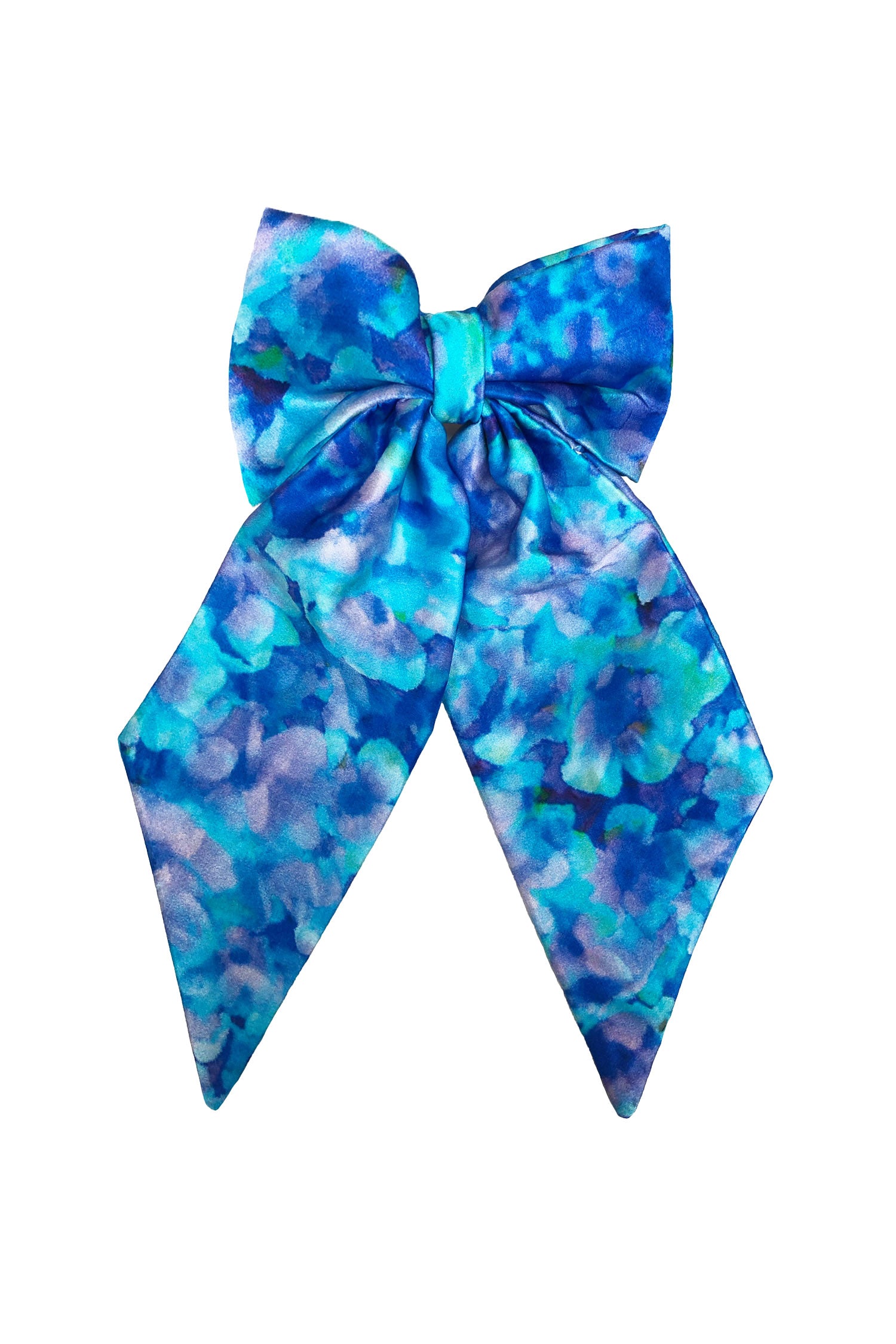 An Isabel Manns silk satin turquoise print bow with ribbon styling and silver hair clip.