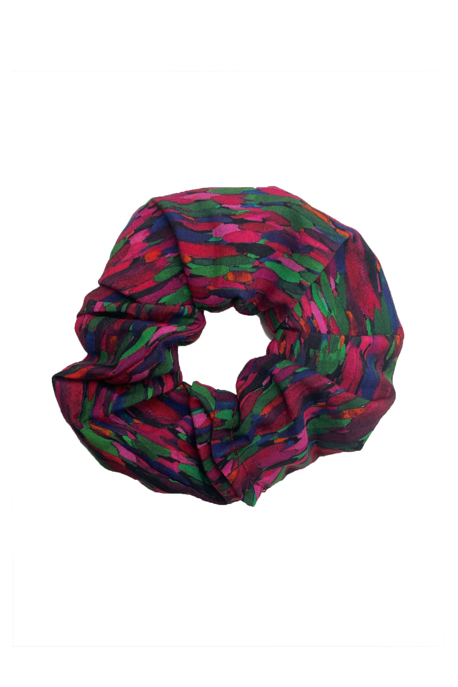An Isabel Manns pink dotted print silk bamboo scrunchie.