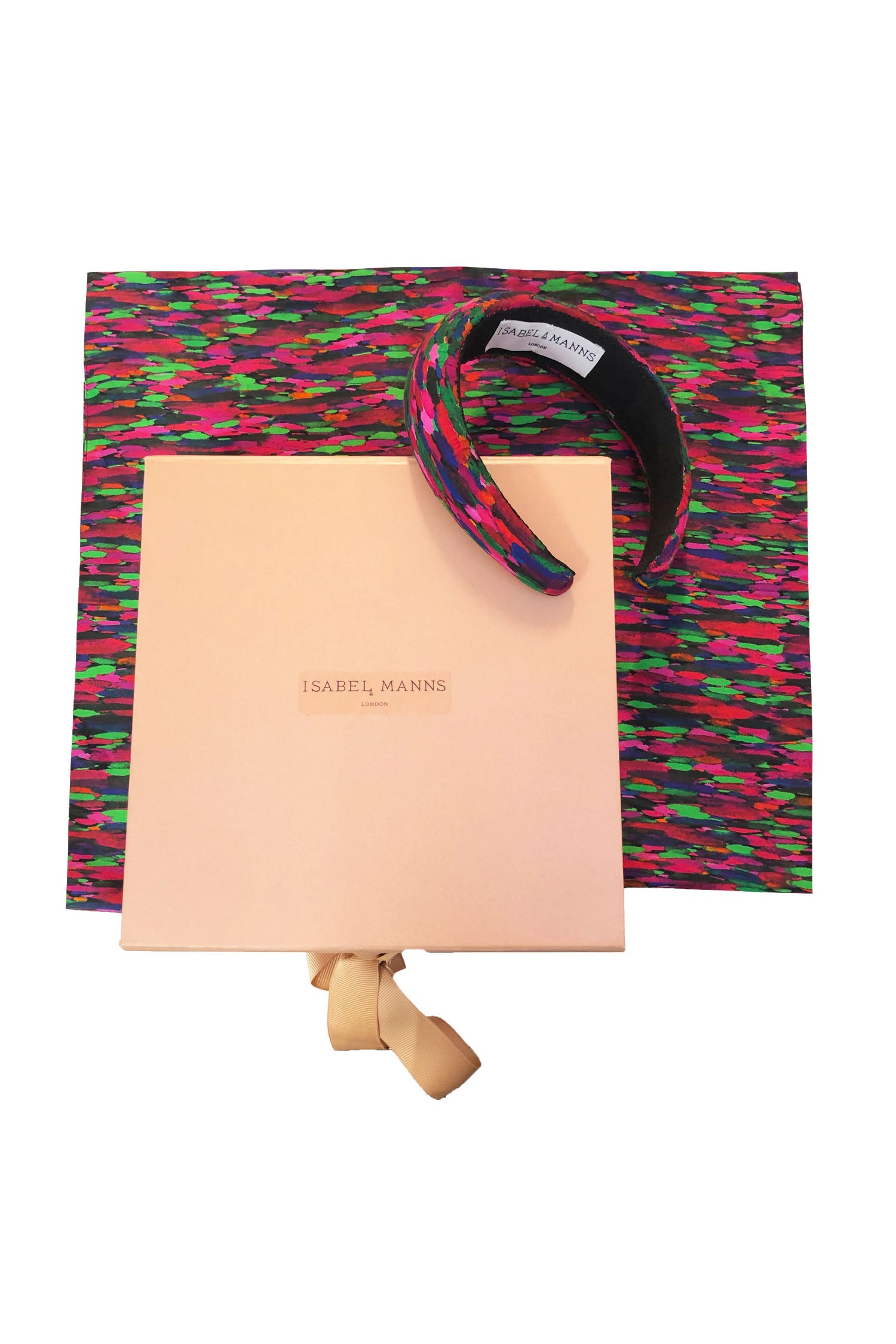Vibrant pink and green print silk satin scarf, with matching padded headband and large pink gift box bow tied ribbon.