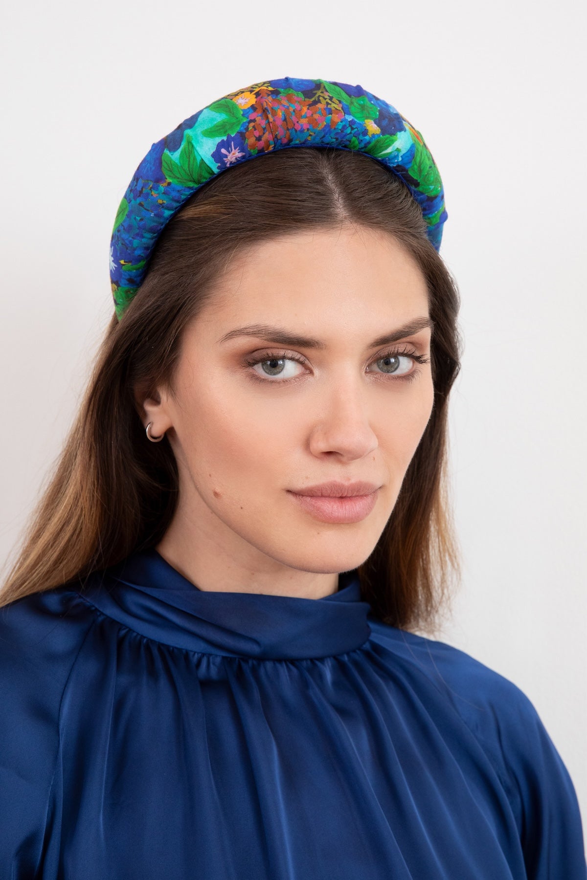a colourful and vibrant print design with a mix colours made into a padded sustainable headband