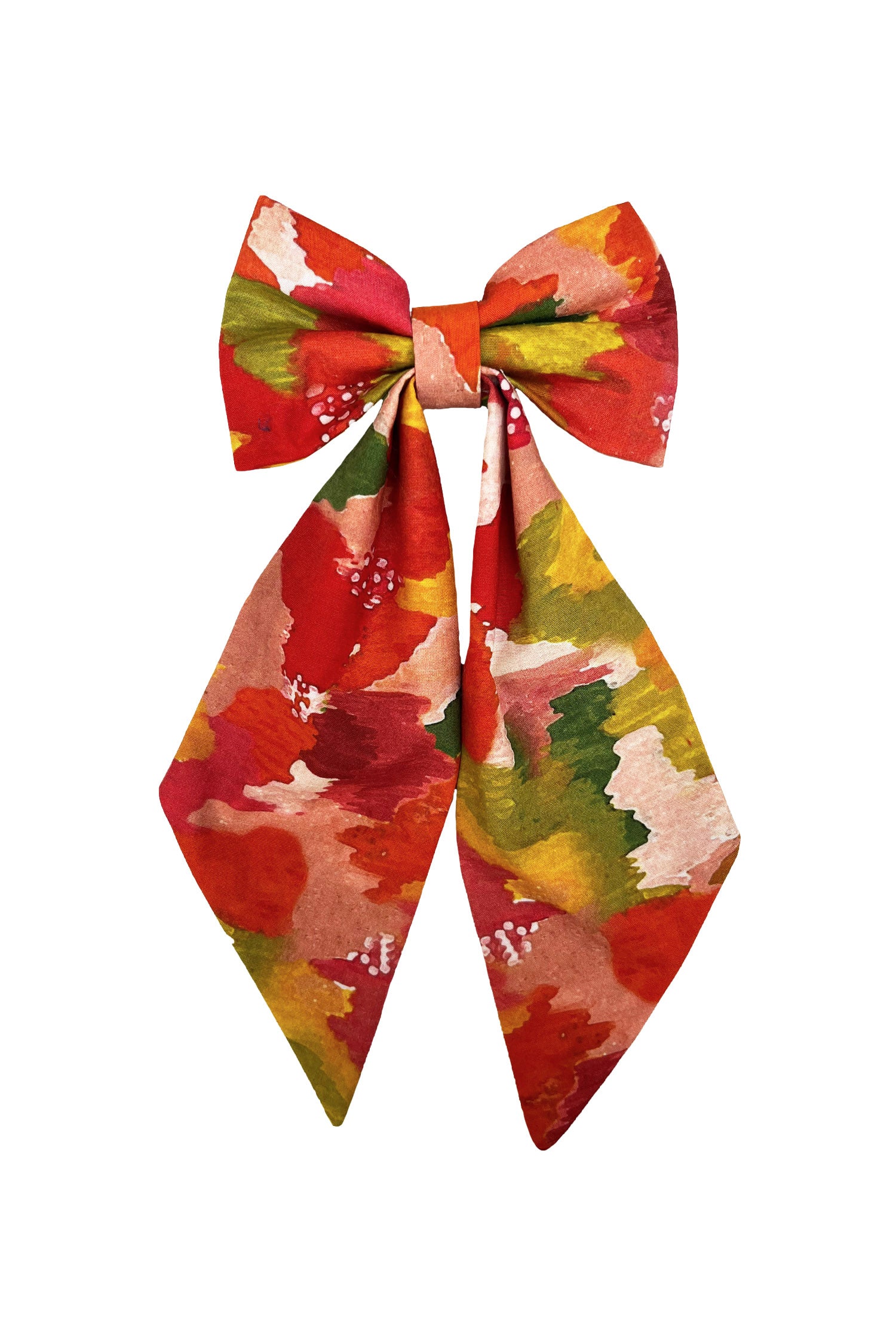 An Isabel Manns multicoloured print silk cotton bow with ribbon styling and silver hair clip.
