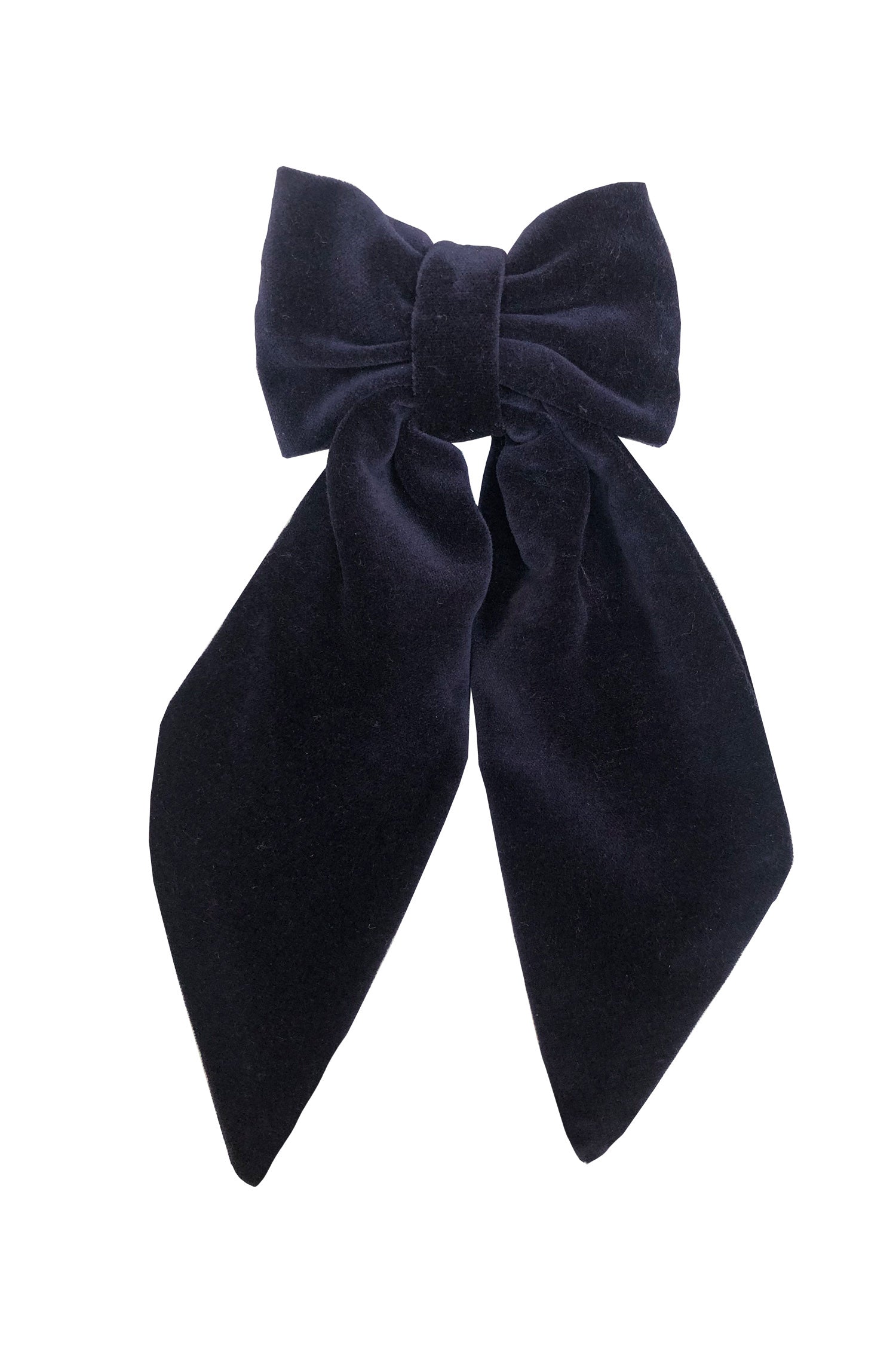 An Isabel Manns navy velvet bow with ribbon styling and silver hair clip.