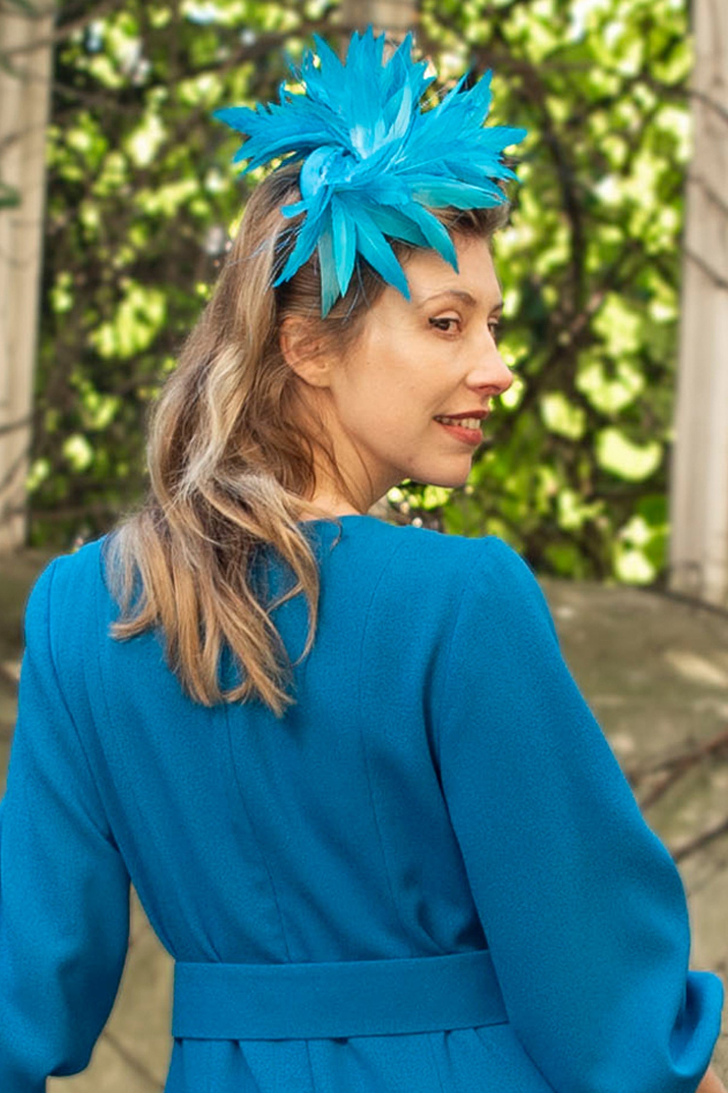 Teal feather thin band fascinator