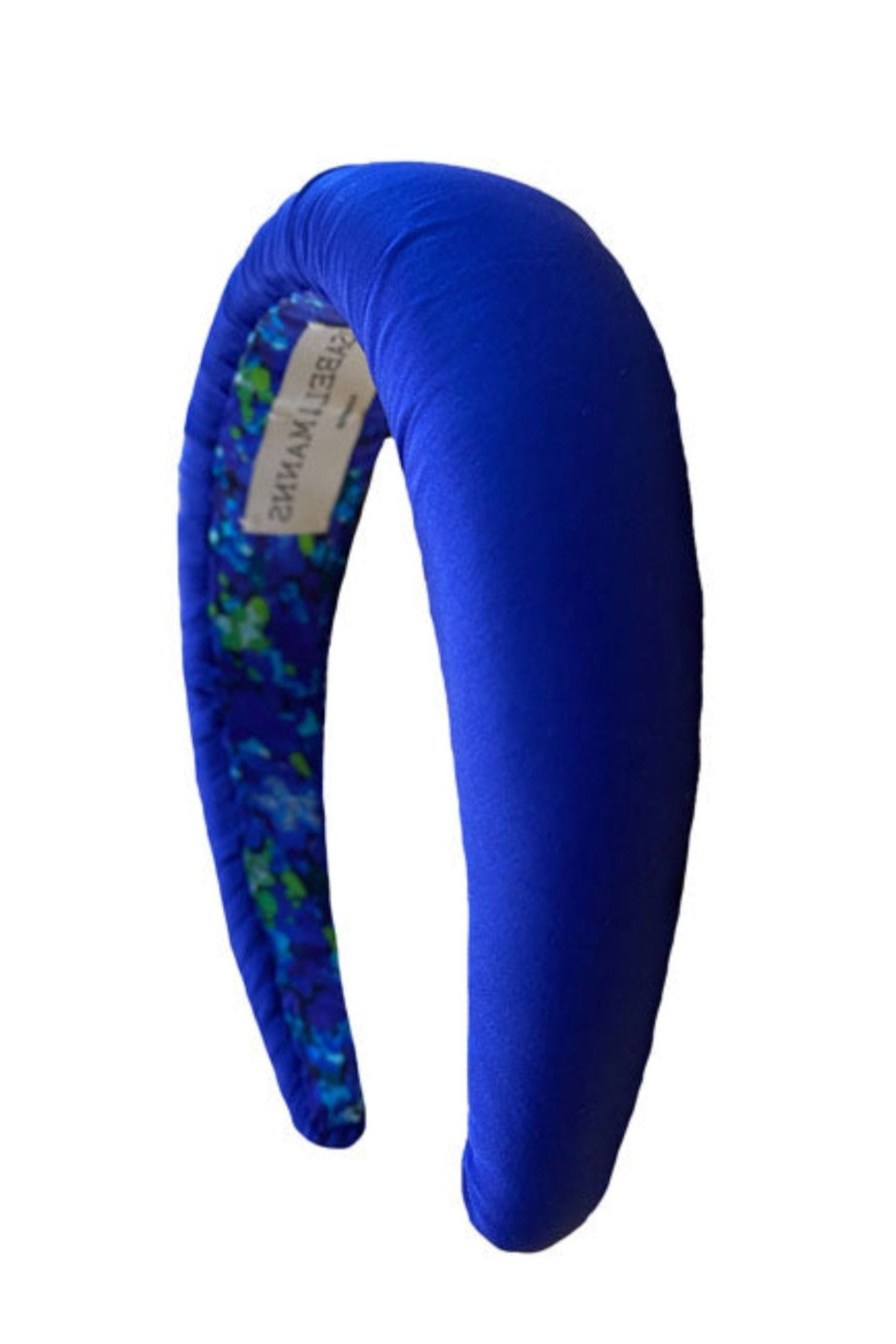 A beautiful silk cobalt blue padded headband that is timeless and elegant