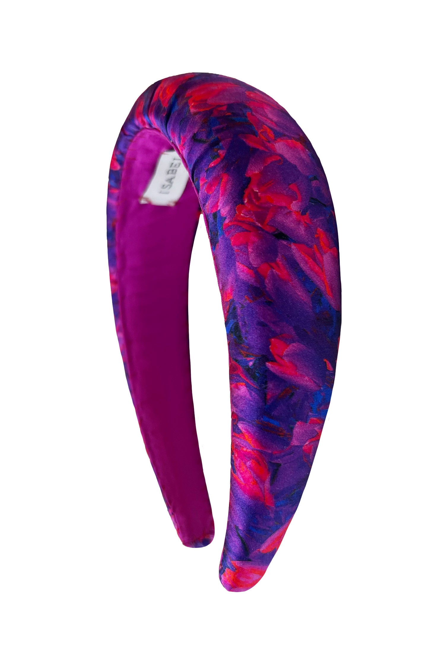 a vibrant pink and purple floral print headband handmade in London
