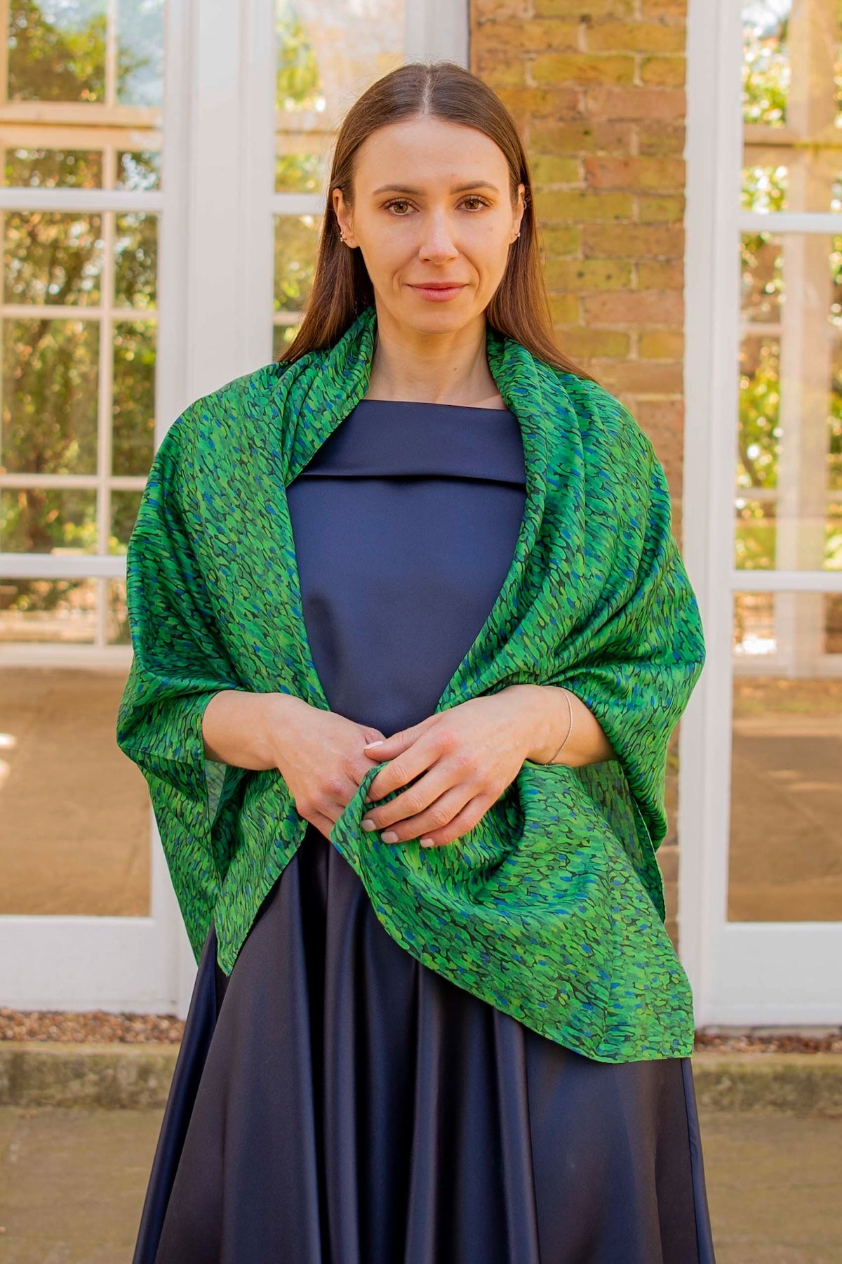 a silk cotton large rectangular scarf worn over a gown