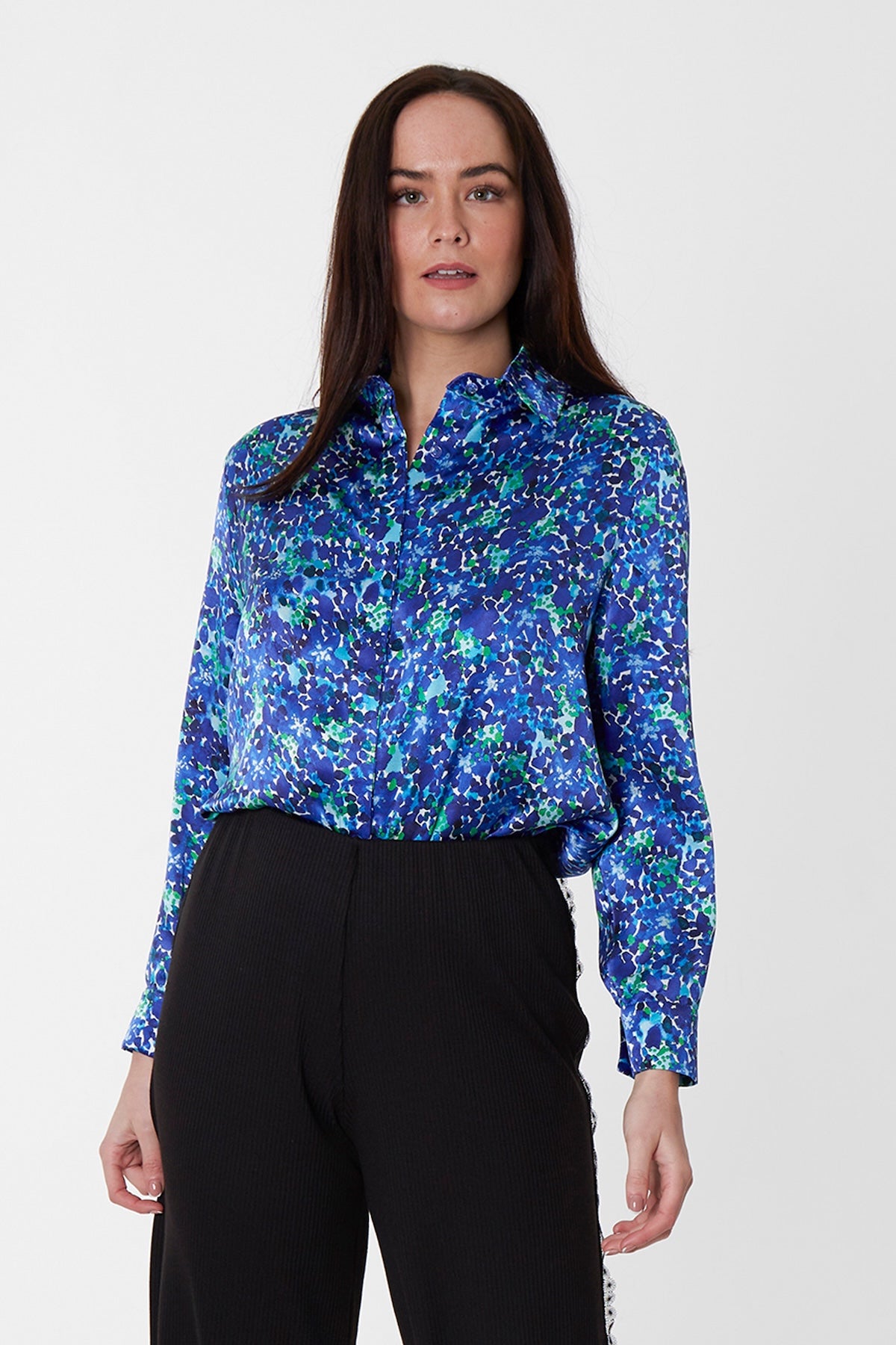 An Isabel Manns silk satin shirt with hidden buttons in blue floral print.