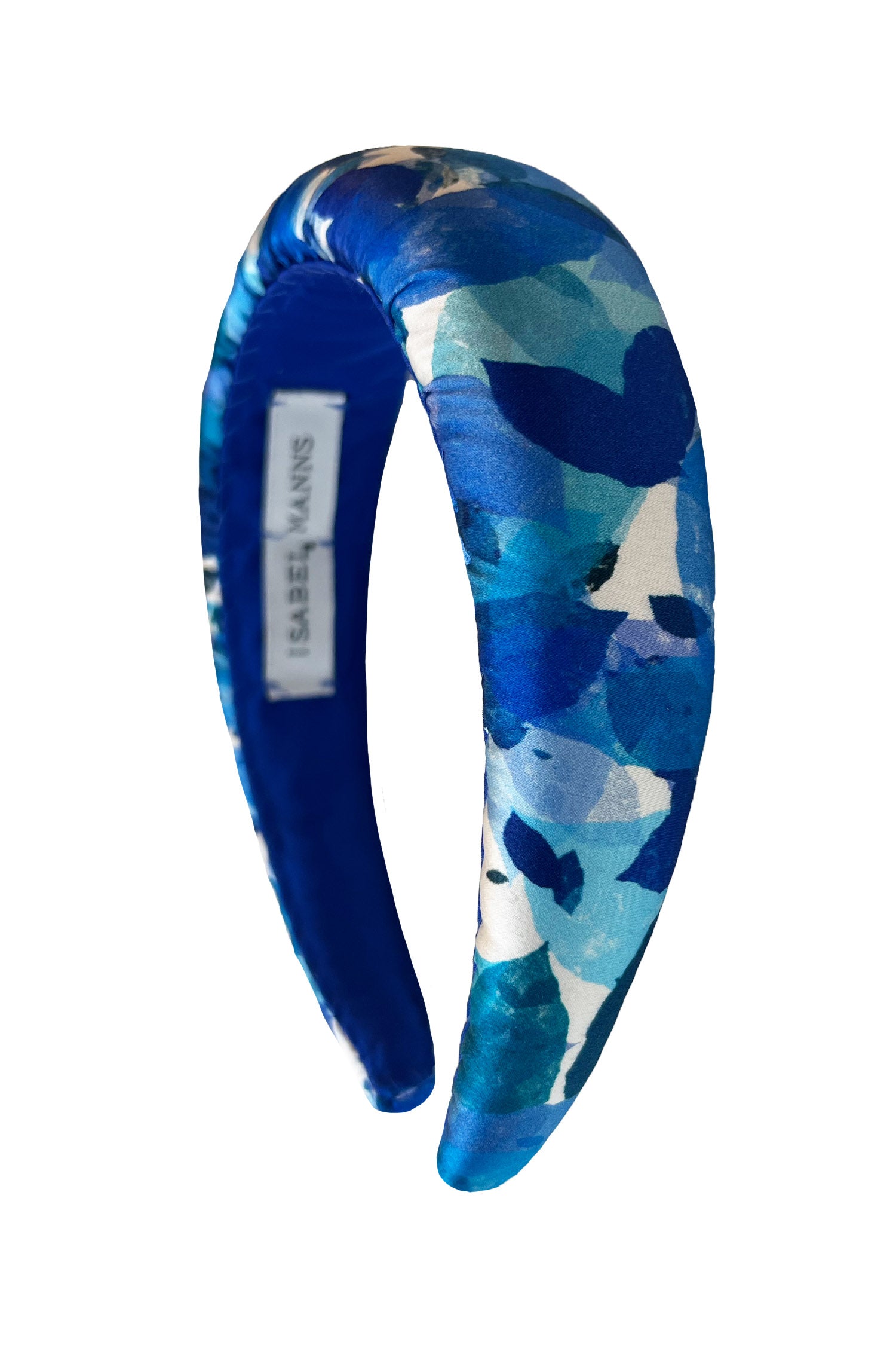 A silk satin blue petal printed padded headband that is elegant