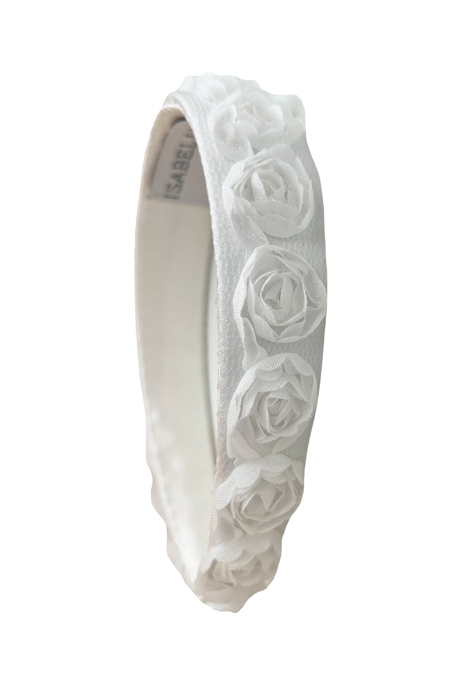 a pretty white headband with delicate rose detail that is ideal for a bride