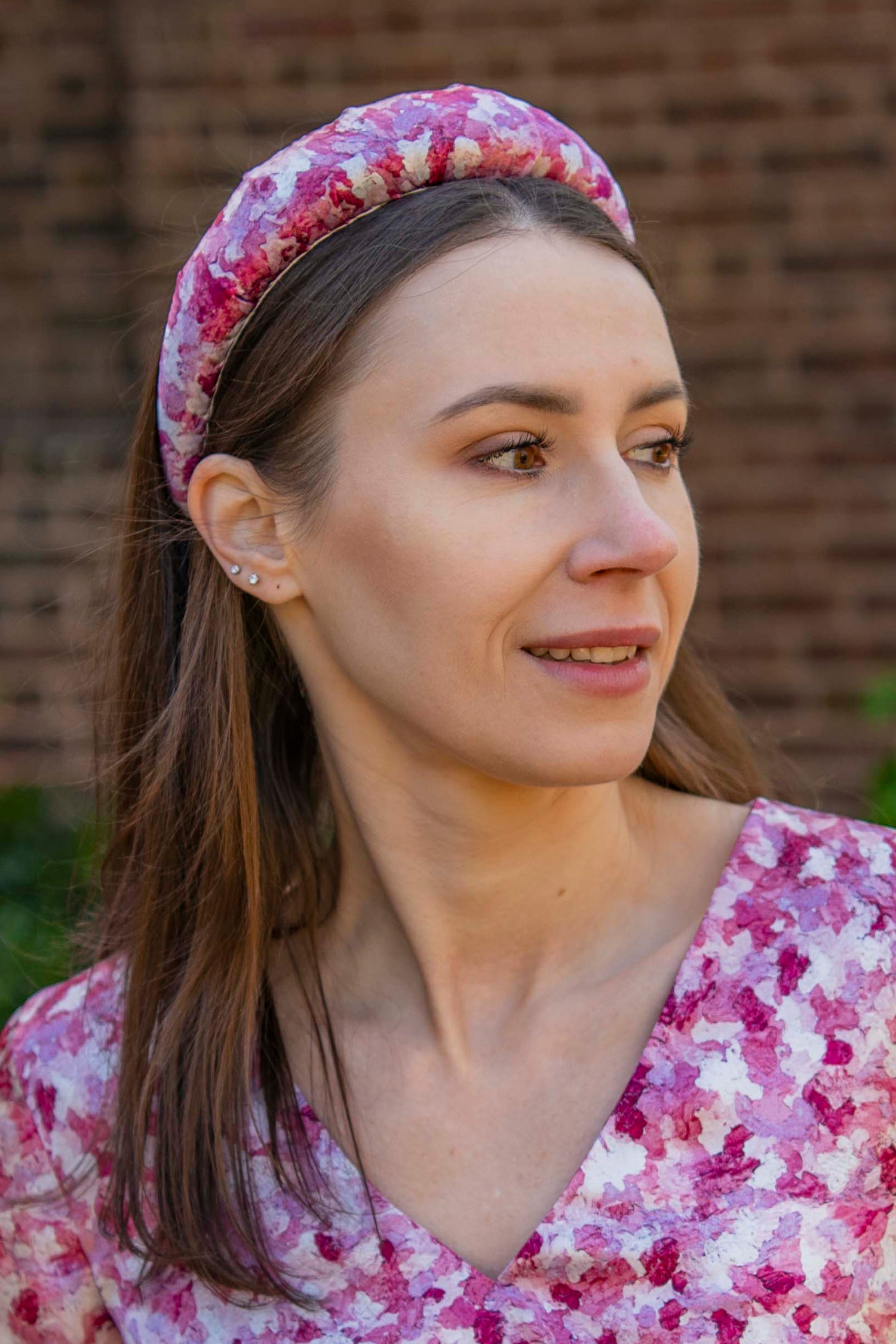 a pink printed silk satin padded headband with a matching dress worn by a model