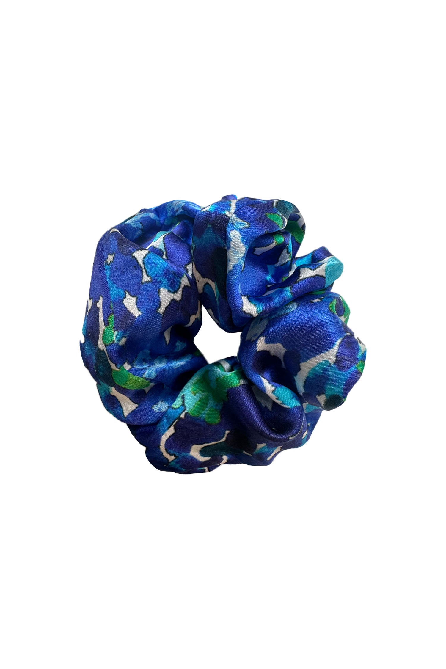 An Isabel Manns blue floral print silk satin scrunchie.