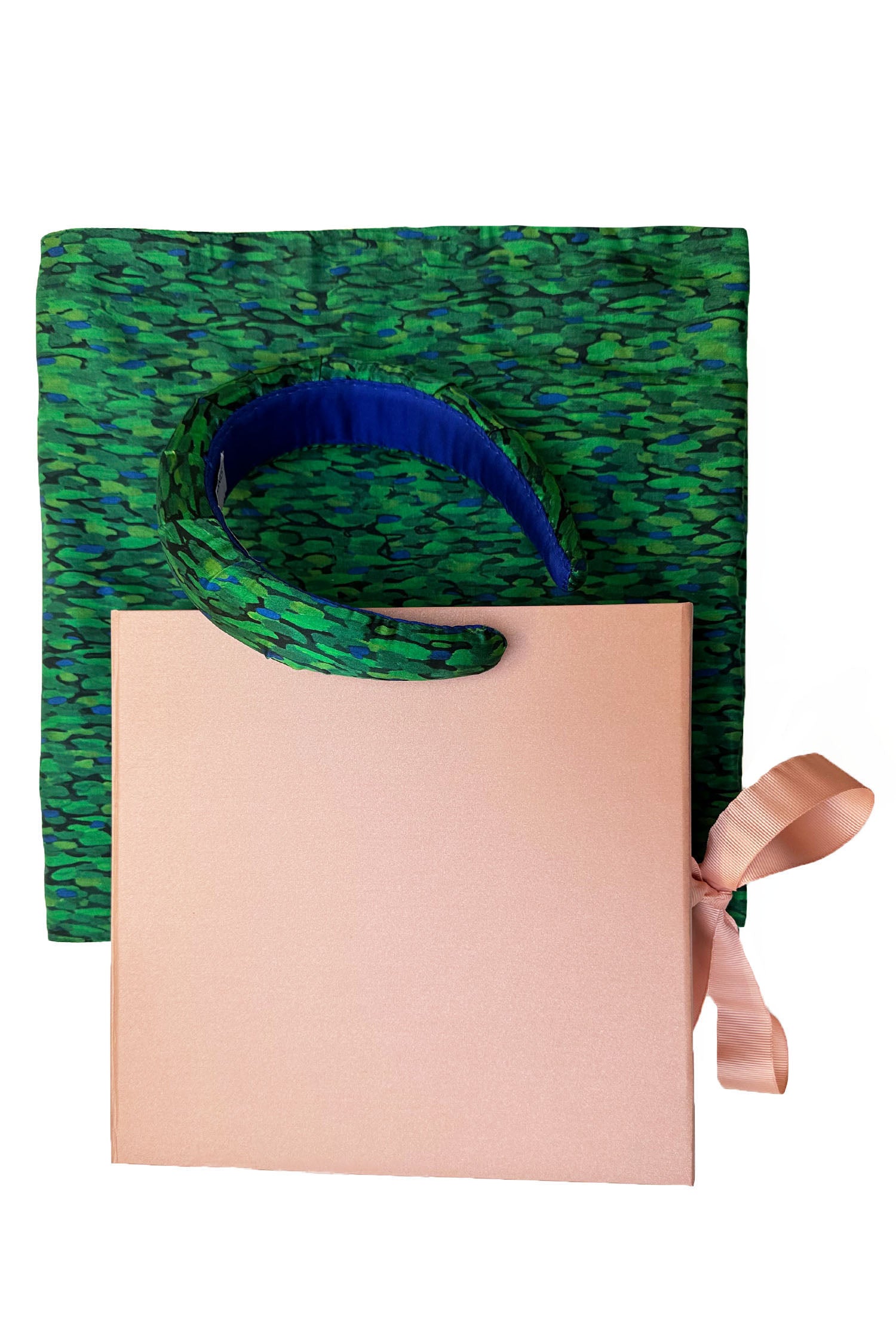 Long double-sided silk satin scarf in vibrant green print, with matching headband and large pink gift box bow tied ribbon.