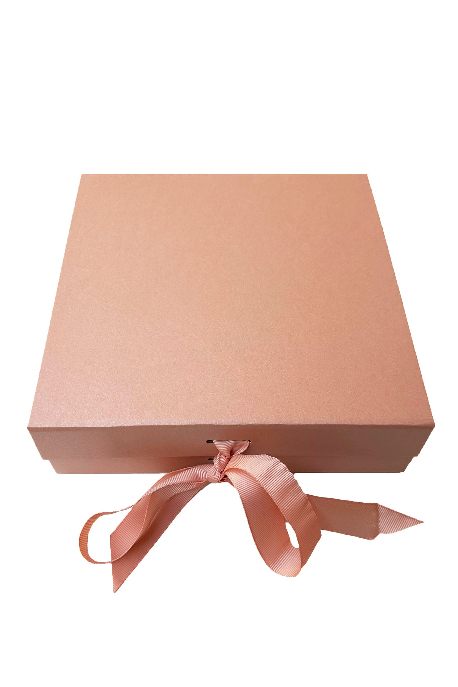 Top view of pink large gift box with bow tied ribbon.