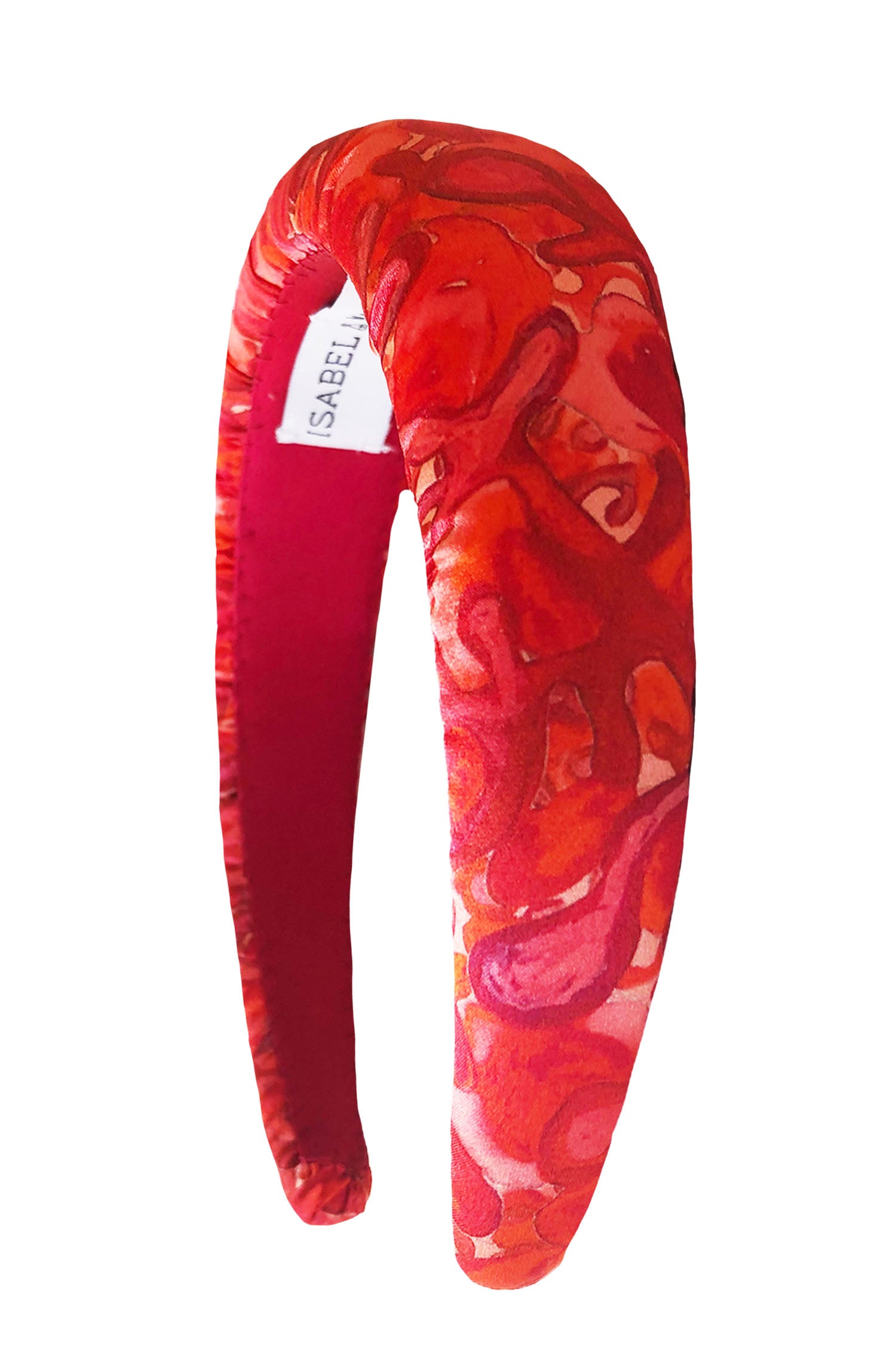 Swirling pattern in pink and red silk satin padded headband