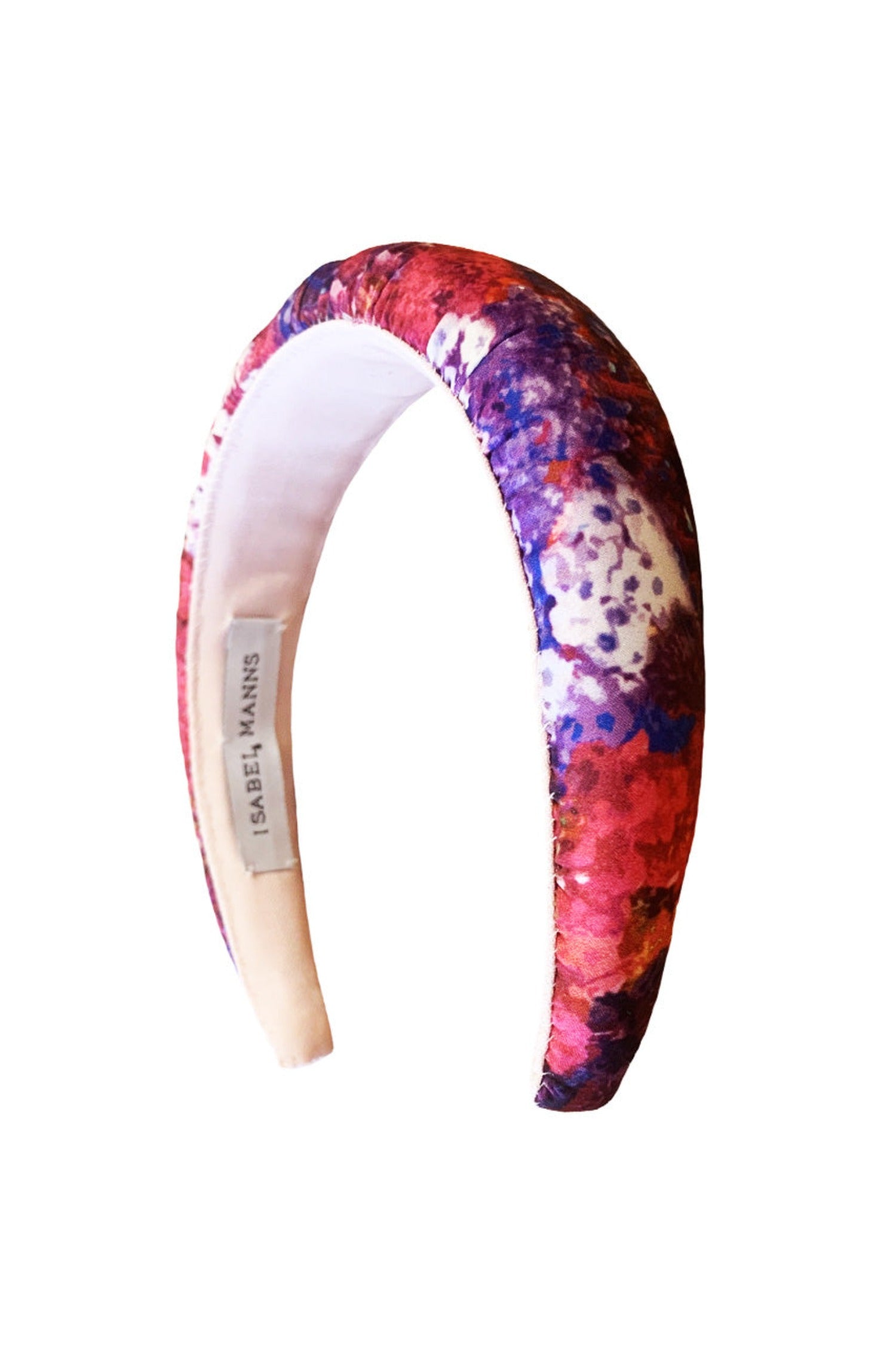 a vivid and vibrant purple and pink floral printed padded headband that gives you a pop of colour to your outfit