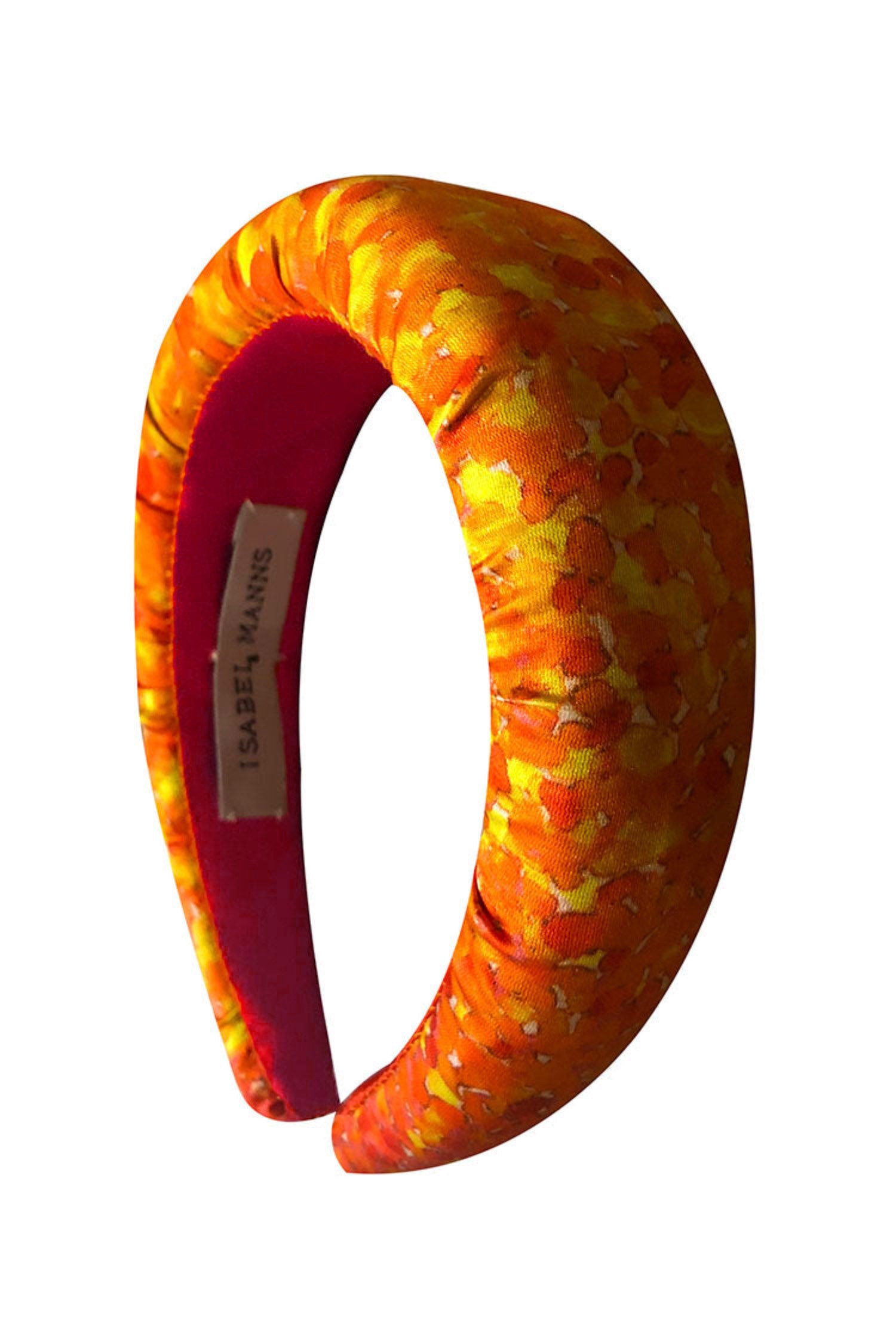 A vibrant orange silk printed padded headband
