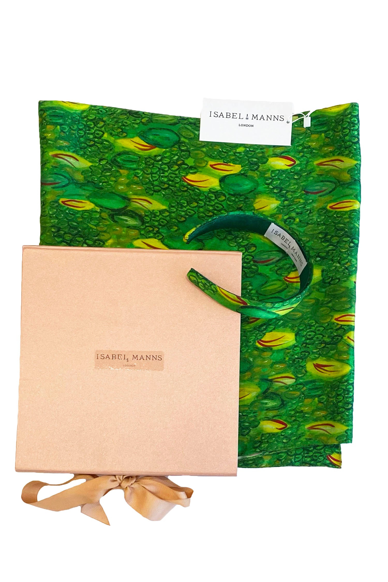 Long double-sided silk satin scarf in green and yellow print, with matching headband and large pink gift box bow tied ribbon.