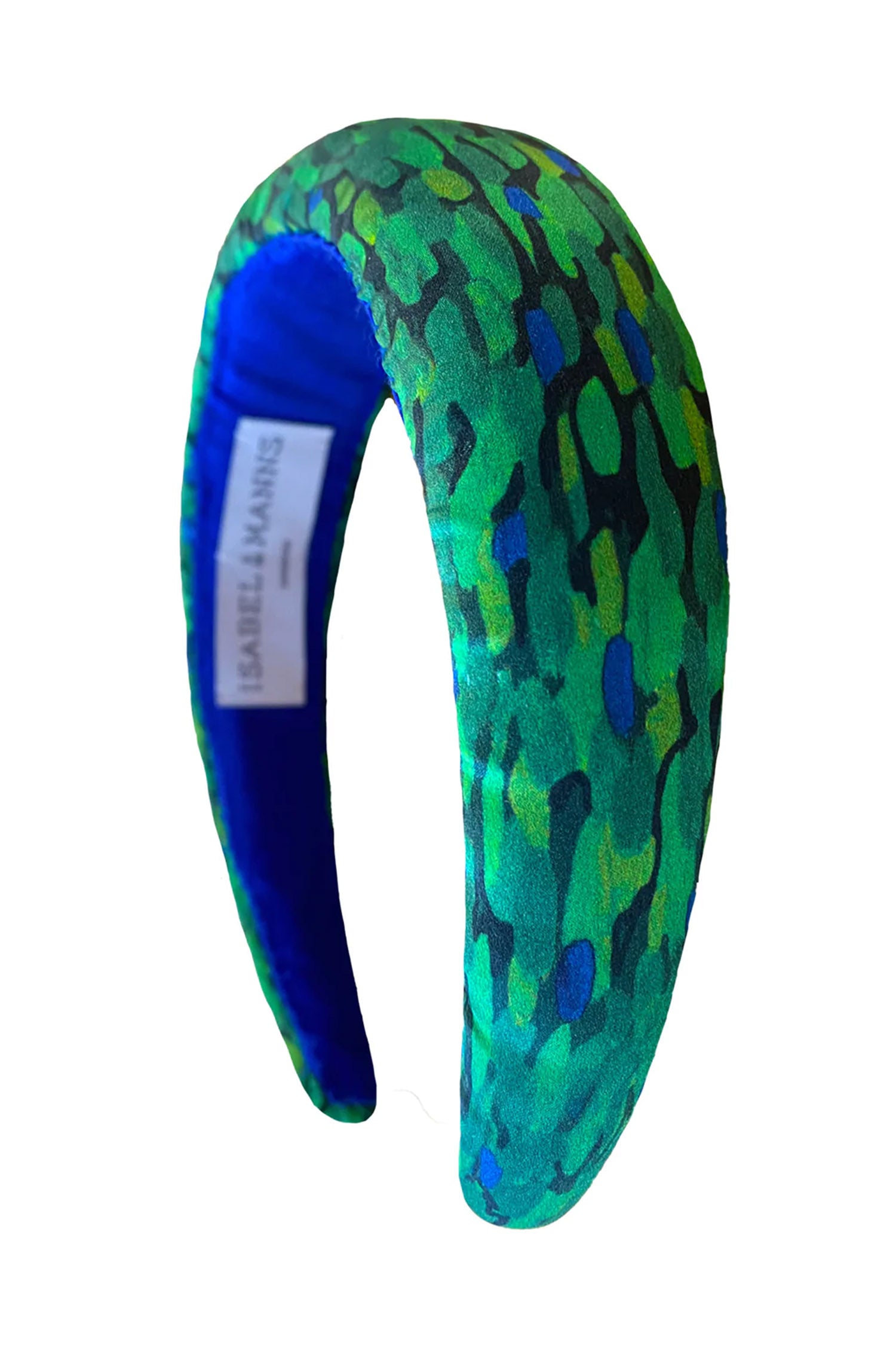 A silk satin padded headband in an emerald print that is handmade