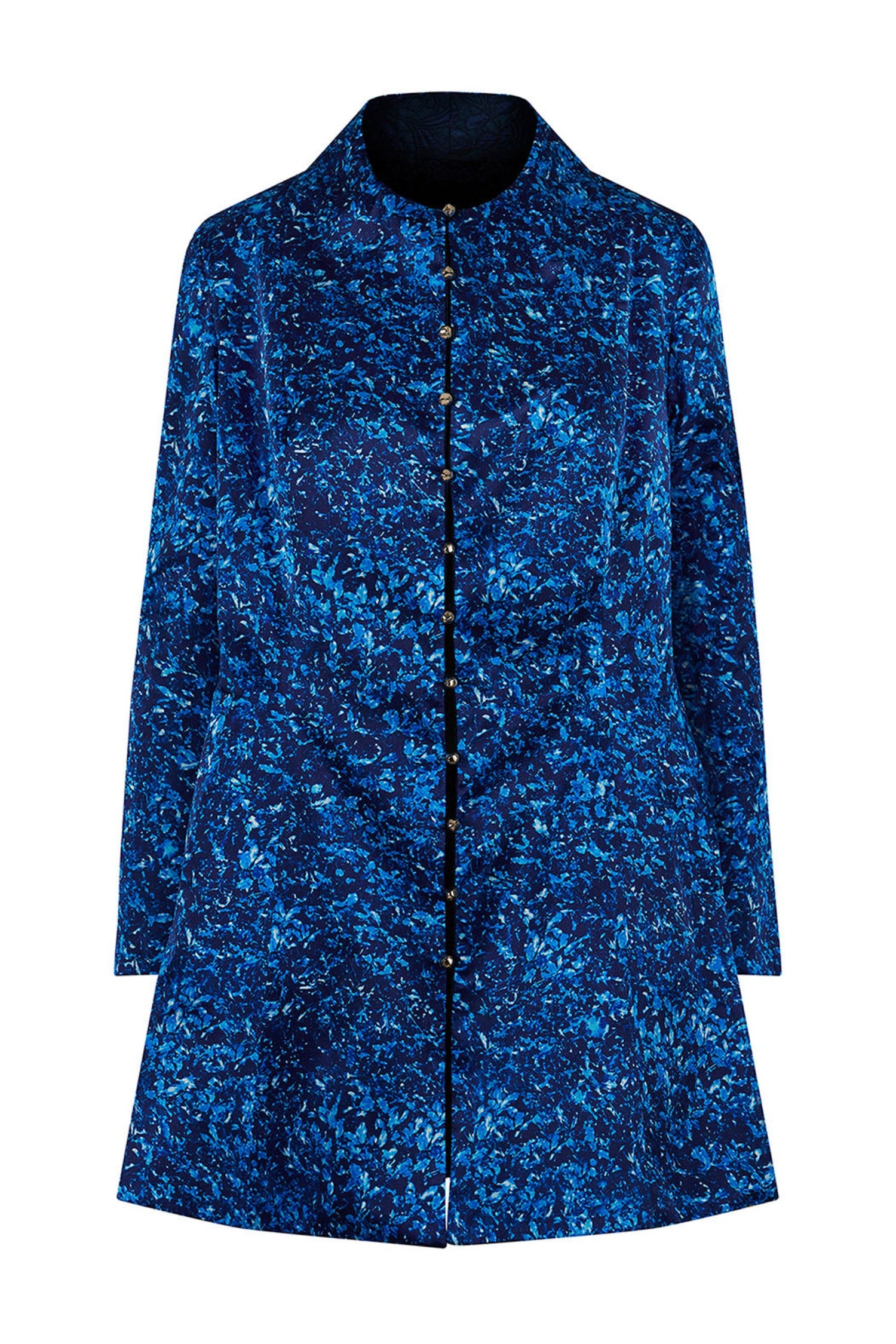 An Isabel Manns reversible fitted A-Line blue sea silk cotton print jacket, with silver bell fastening.