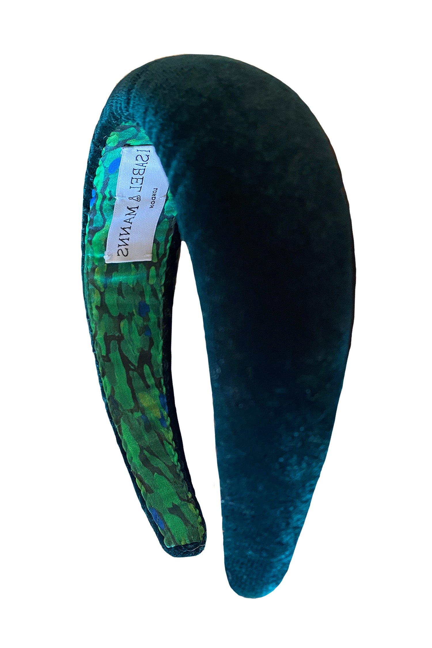 A stylish, elegant and luxurious dark green velvet padded headband