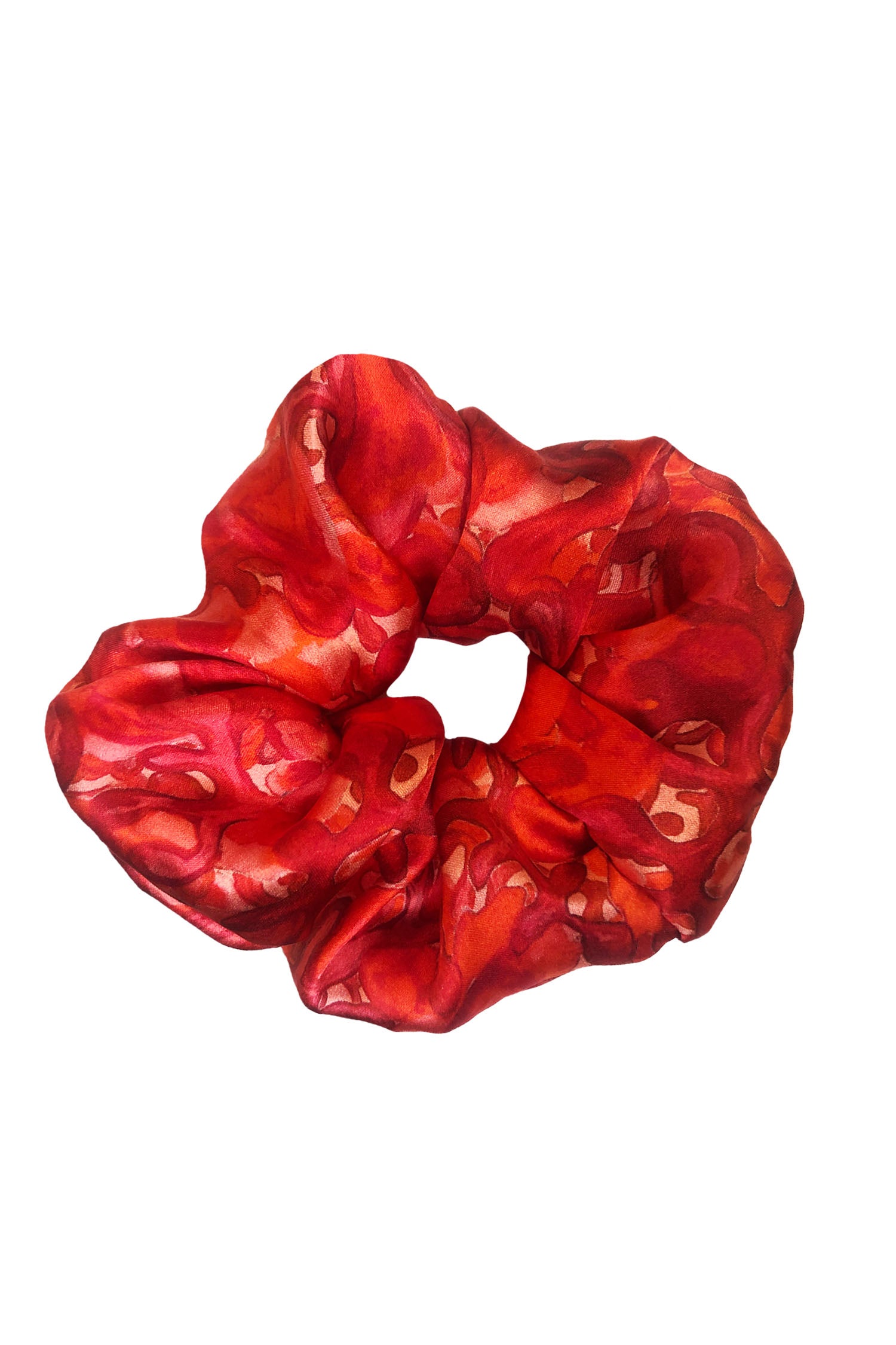 An Isabel Manns red swirl print silk satin scrunchie.