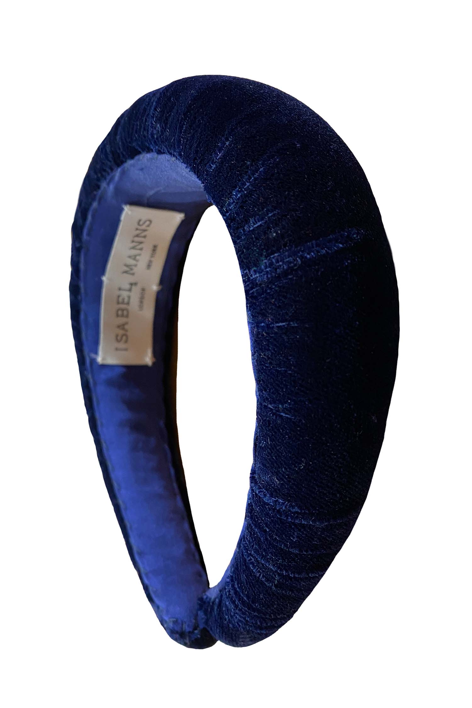 A timeless and versatile luxurious navy velvet padded headband is a stylish aceessory