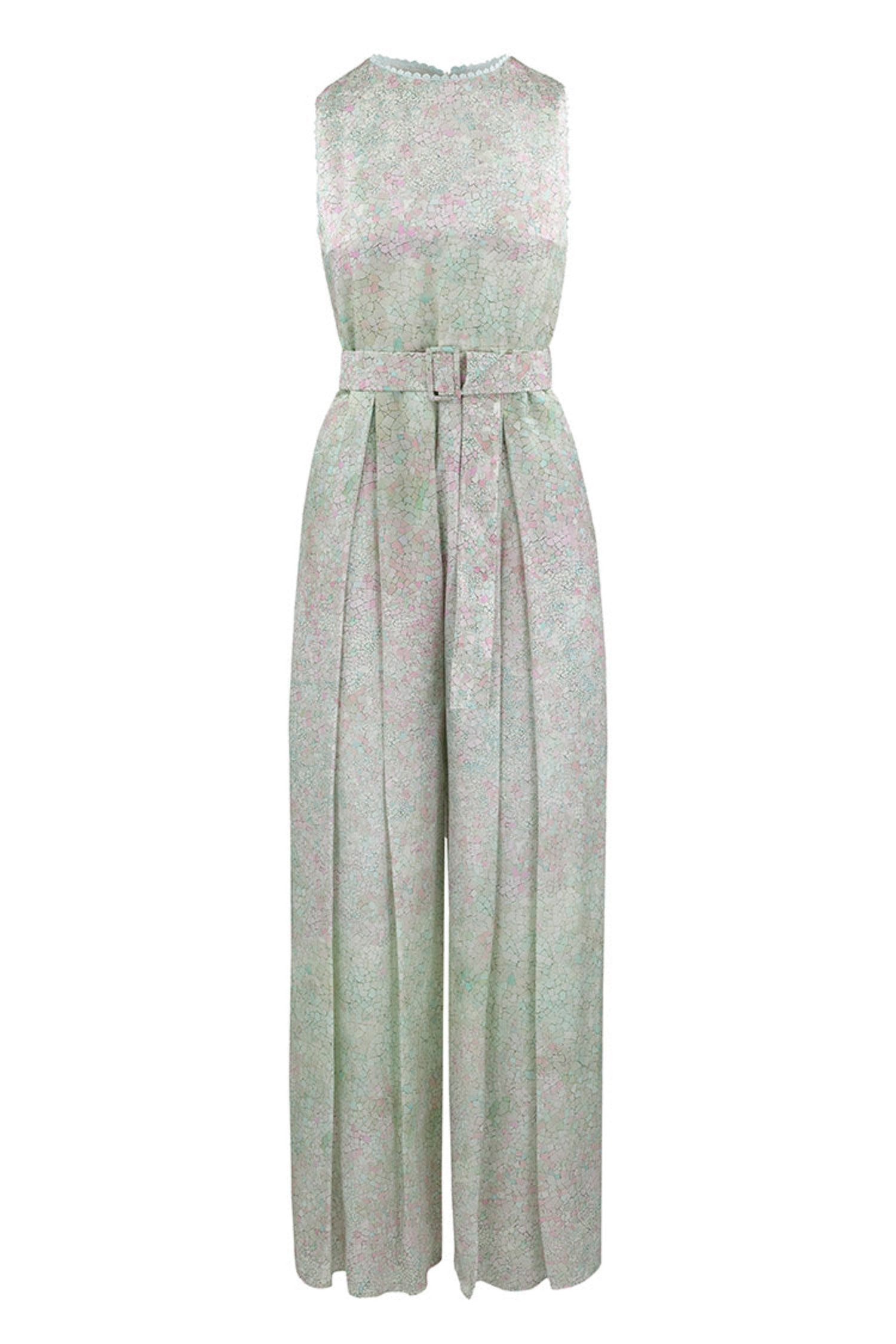 Sleeveless wide leg silk cotton jumpsuit and matching belt that comes in a pastel blue print.