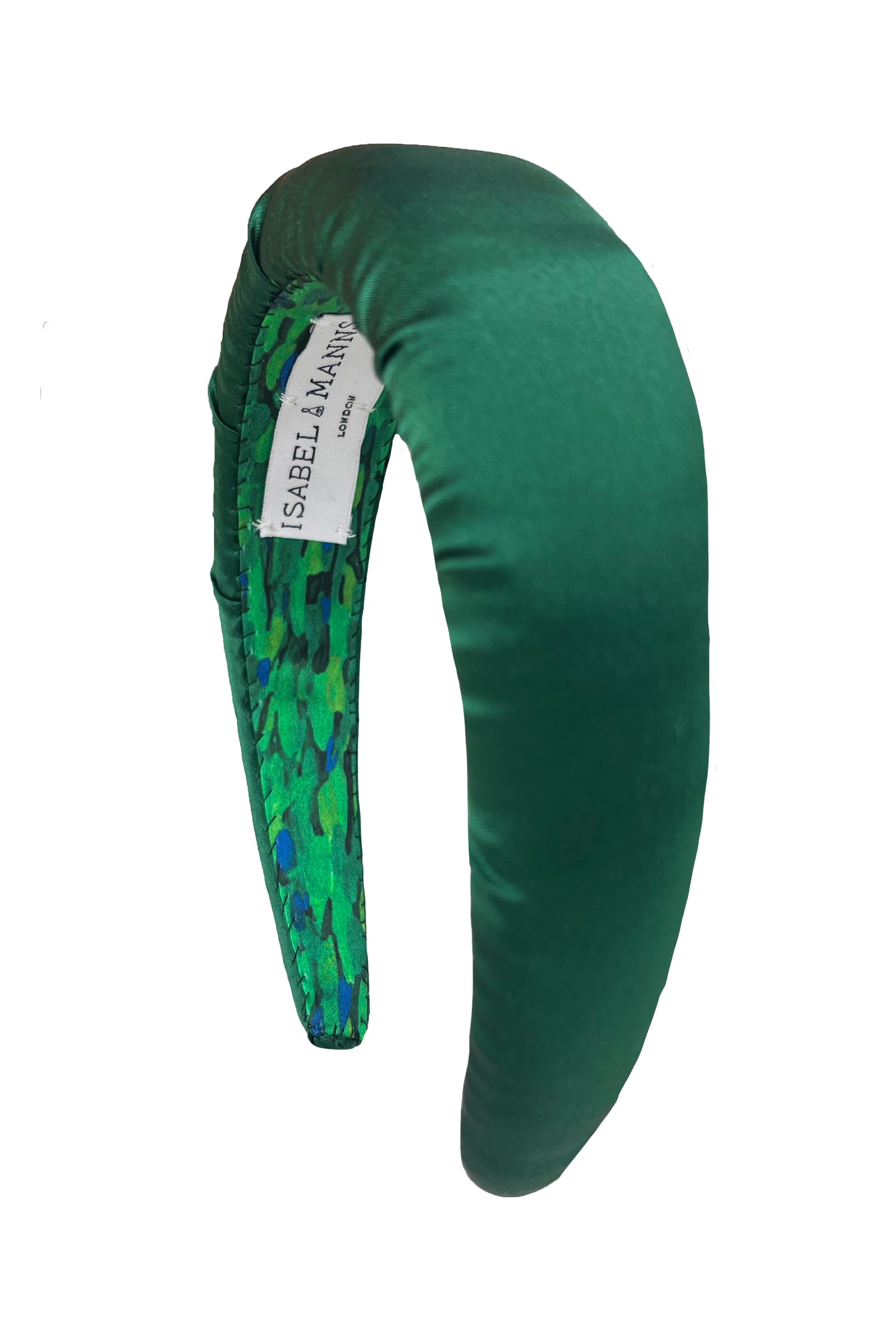 a dark green silk satin padded headband that is stylish