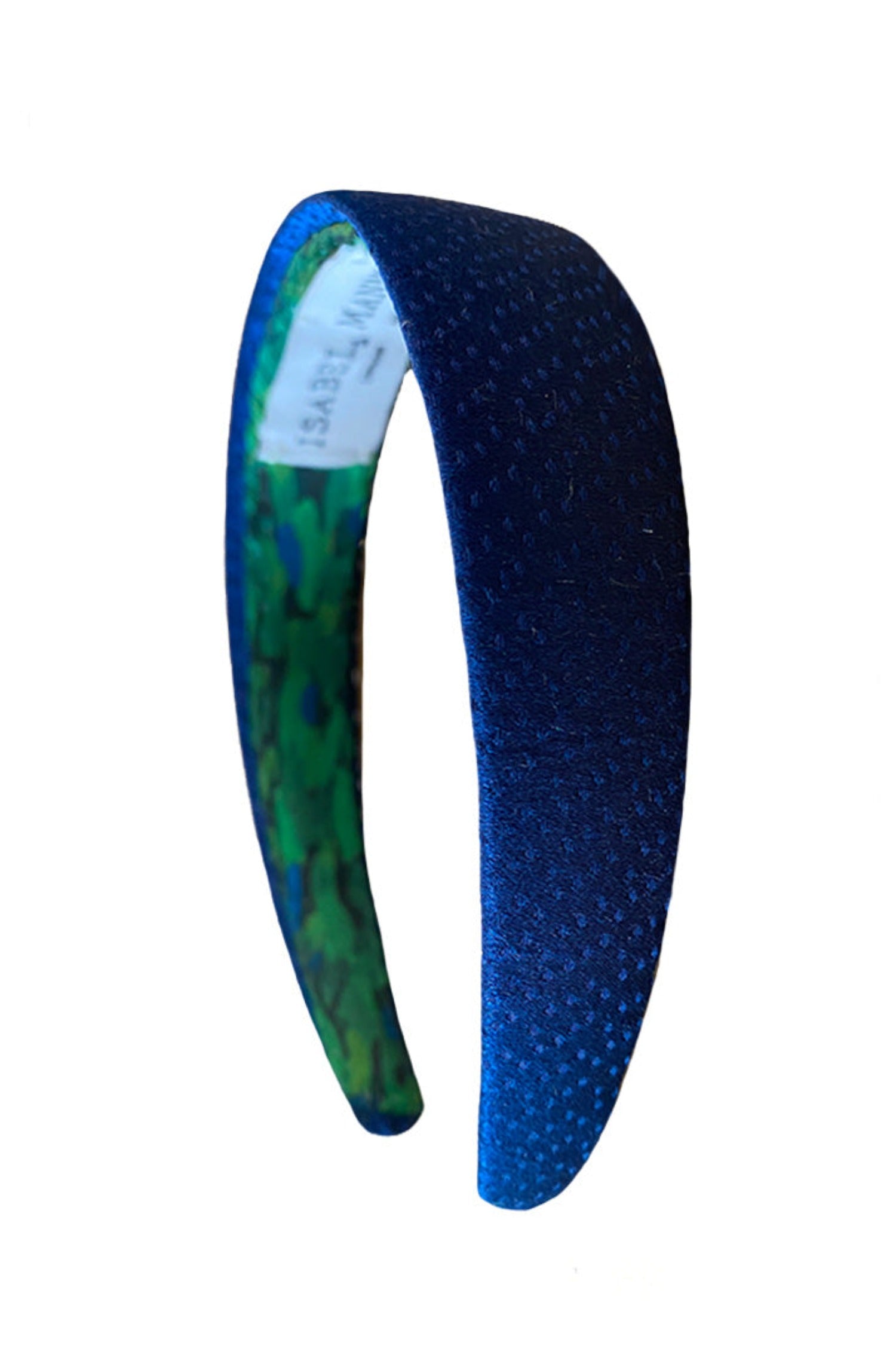 a classic navy headband that has a dotted texture to the fabric making it timeless and versatile