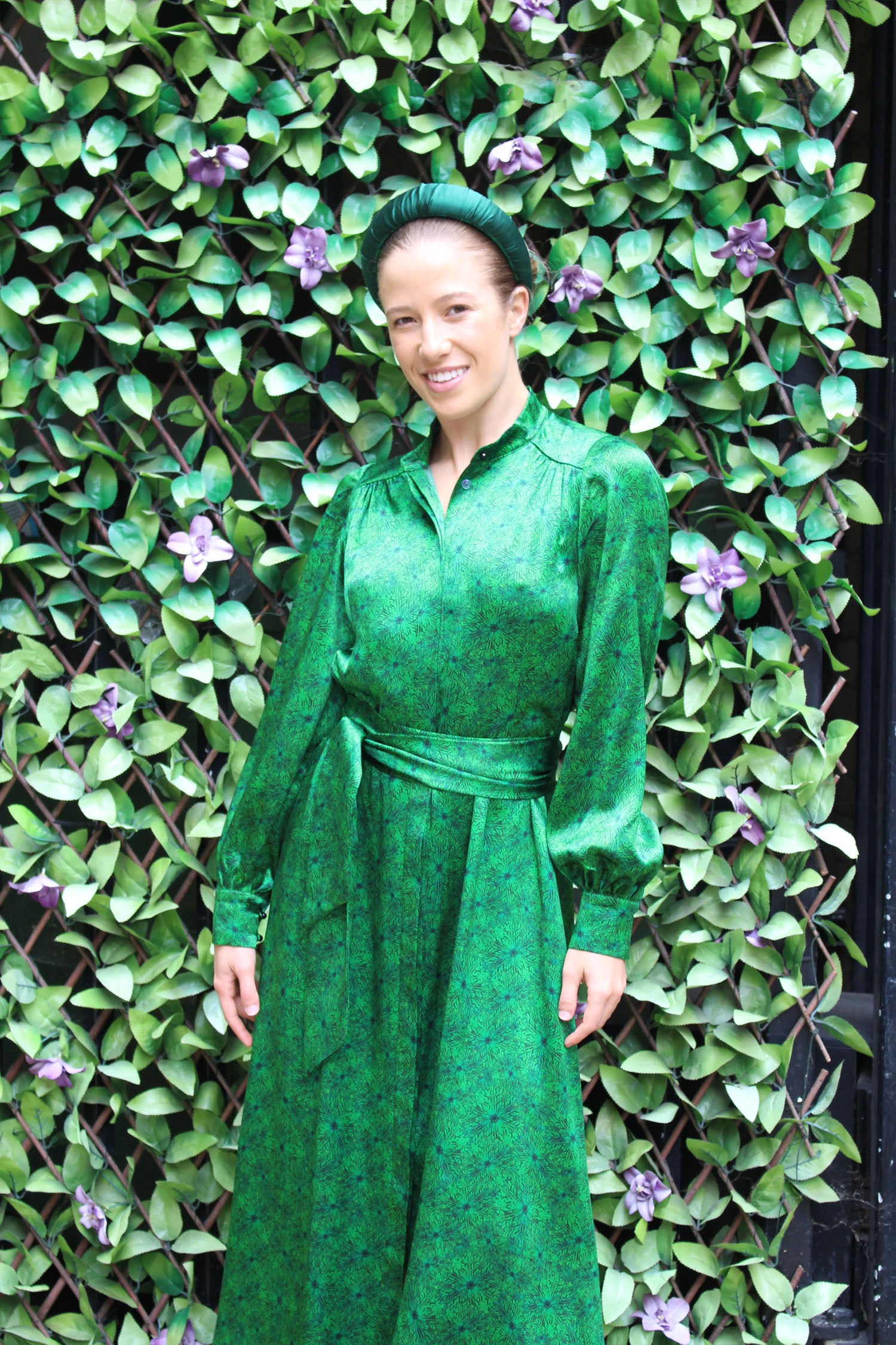 a green silk satin long sleeve dress