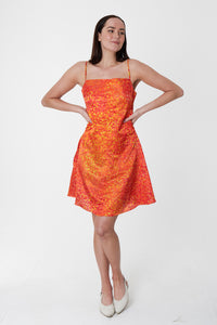 a short orange printed silk cotton dress