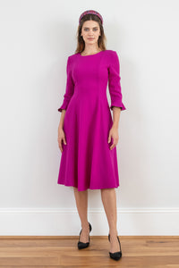 pink wool crepe long sleeve midi dress with princess style seams