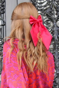 Elegant silk hair bow accessories made sustainably in London using surplus fabric