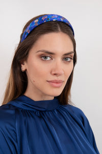 Model showcasing celestial petals silk printed hand-made headband 