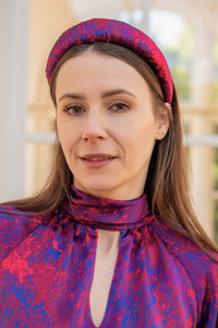a beautiful red printed silk satin padded headband and matching dress on model