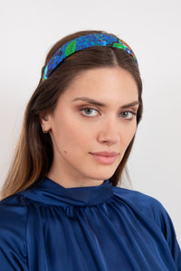 colourful printed headband that will add a unique touch worn by a model