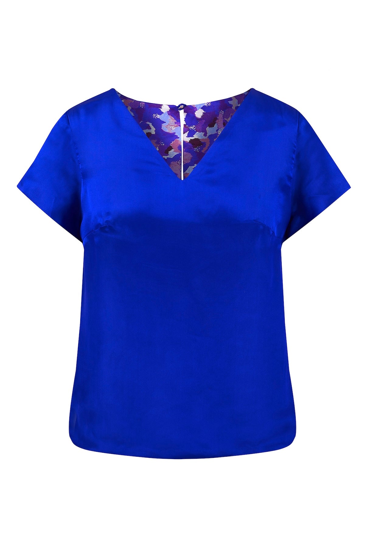 Reversible v-neck silk satin top with elbow length sleeves in blue floral print, worn with matching Emma skirt navy and padded headband.