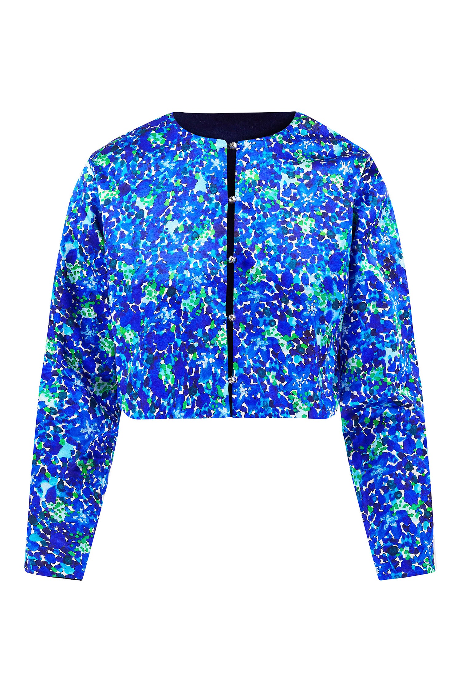 An Isabel Manns reversible box shaped cropped blue floral print jacket, with silver bell fastening.