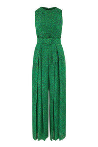 Sleeveless wide leg silk cotton jumpsuit and matching belt that comes in a vibrant green print.