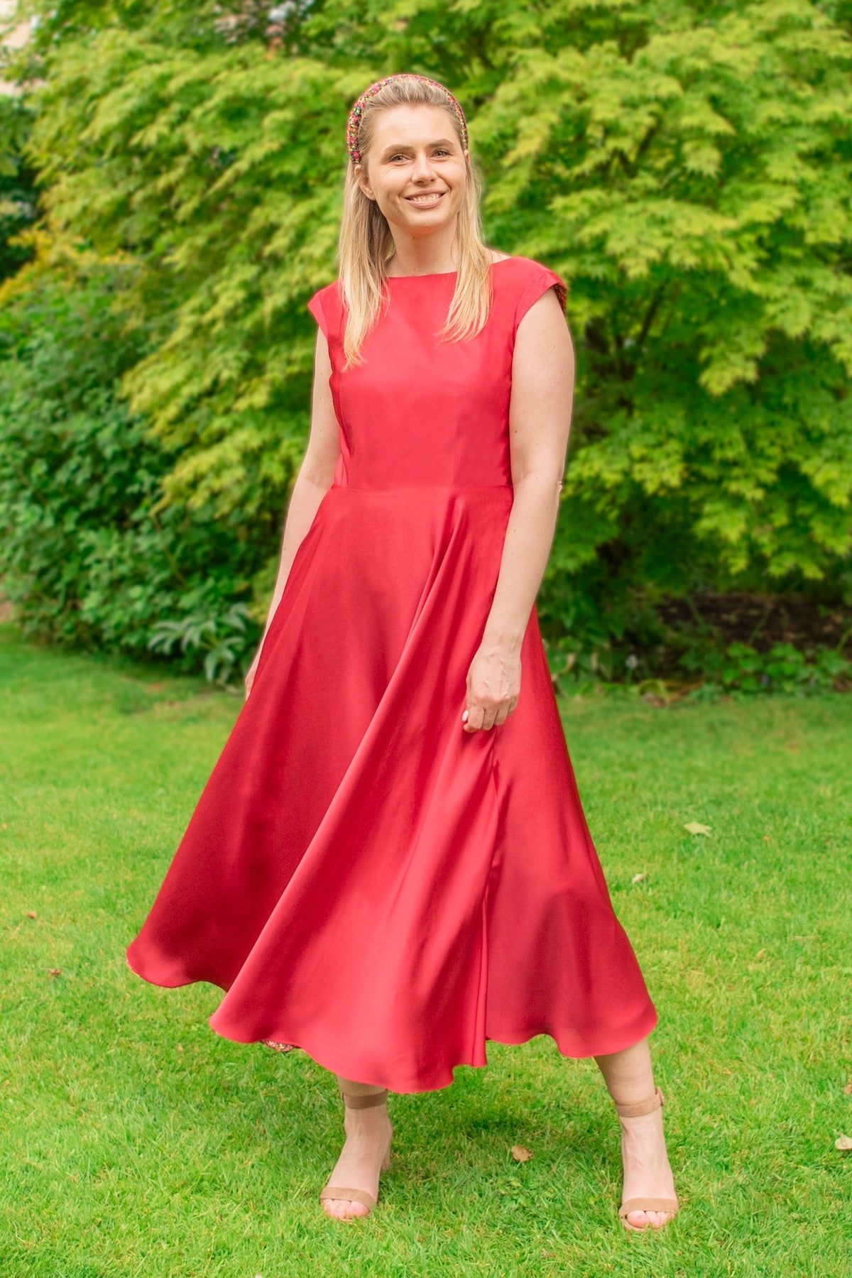 Reversible Victoria Gown Raspberry Pink front view in motion.