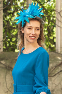 Teal feather thin band fascinator 