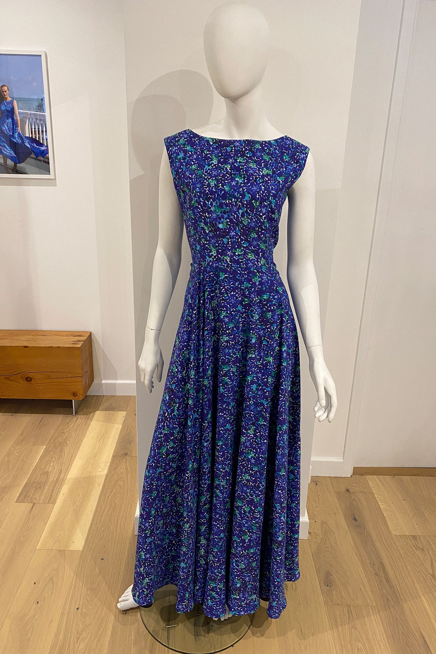 A customised and made to measure signature Reversible Caroline gown by Isabel Manns in a customers chosen colours consisting of a blue floral print