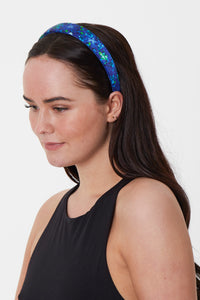 aqua flora headband worn by a model