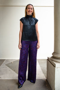 front view purple mystery palazzo pants with black silk top