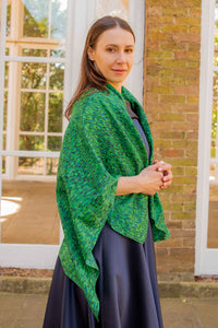 a silk cotton large rectangular scarf worn over a gown side view