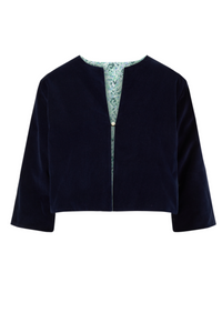 An Isabel Manns reversible box shaped cropped navy velvet jacket, with pearl button.