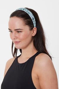 a lawn magic headband worn by a model