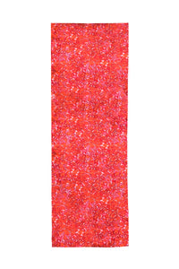 Long double-sided silk satin scarf in vivid red and pink print.