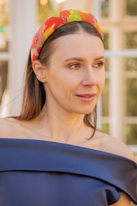 a multi coloured vivid printed padded headband