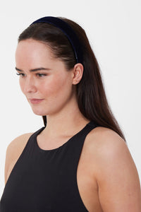 A classic navy velvet headband sustainably made in the Uk